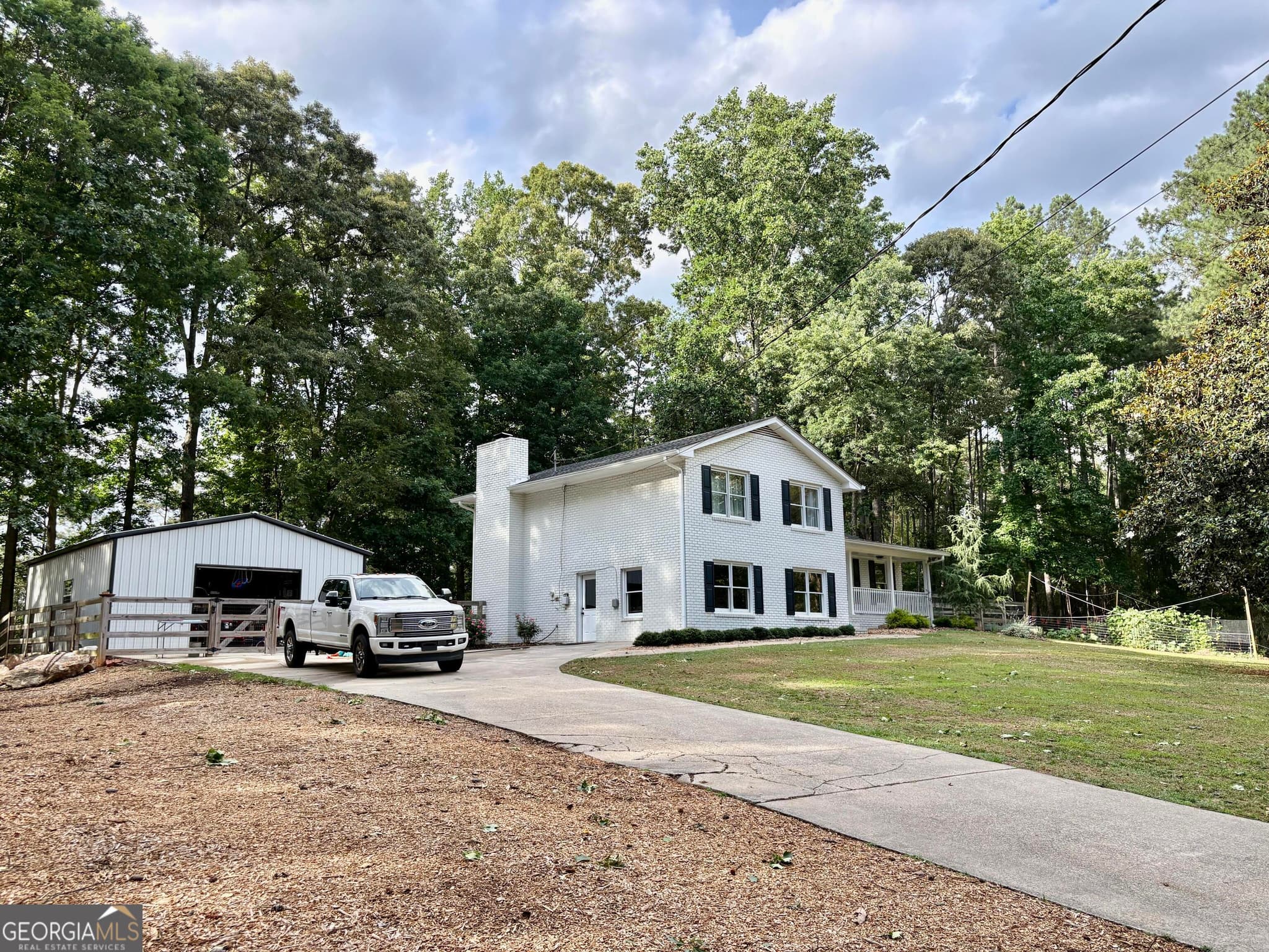 4 bedroom, 3 bathroom, 2,257 sq ft single family residence sold at 1068 Riverside Road, Sugar Hill, GA 30518