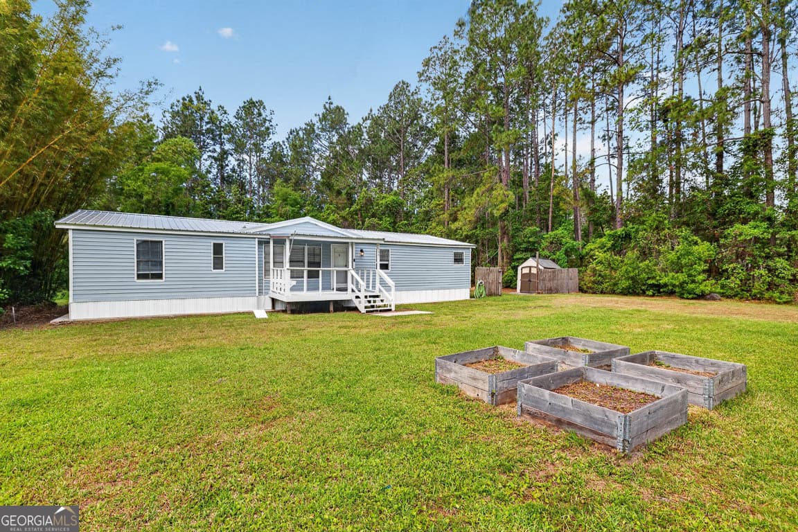 3 bedroom, 2 bathroom, 1,440 sq ft manufactured home,single family residence for sale at 155 Pine Crossing Street, Woodbine, GA 31569