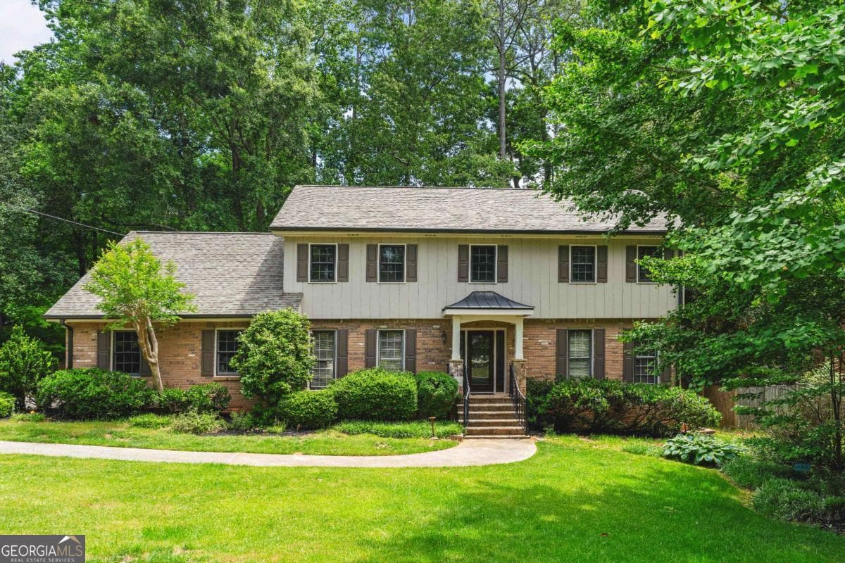 5 bedroom, 2.5 bathroom single family residence sold at 4955 Mill Stream Court, Atlanta, GA 30338