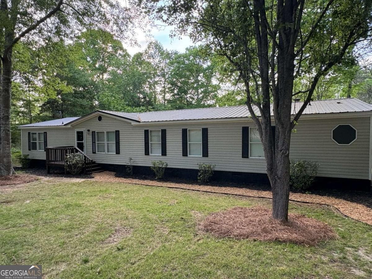 4 bedroom, 2 bathroom mobile home sold at 5577 Wapakonata Trail, Oxford, GA 30054