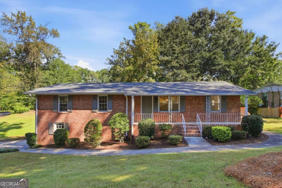 4 bedroom, 3 bathroom, 2,025 sq ft single family residence for sale at 31 Huntwood Drive, Smyrna, GA 30082