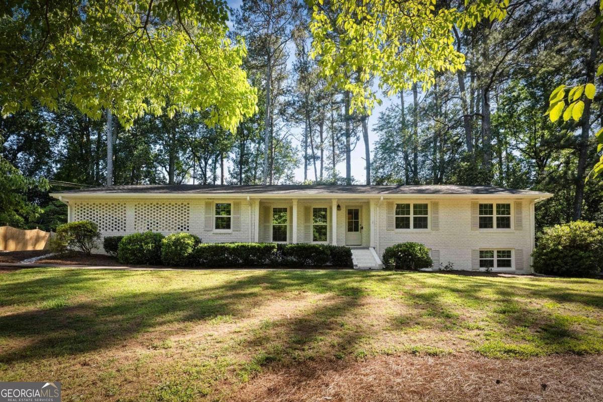 4 bedroom, 2 bathroom, 2,697 sq ft single family residence sold at 1677 Rochelle Drive, Dunwoody, GA 30338