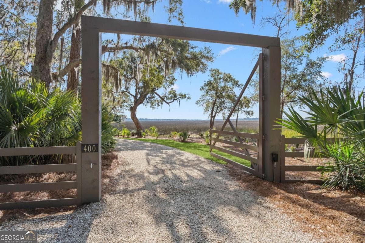 4 bedroom, 5 bathroom, 6,119 sq ft single family residence for sale at 400 Stevens Road, St. Simons, GA 31522