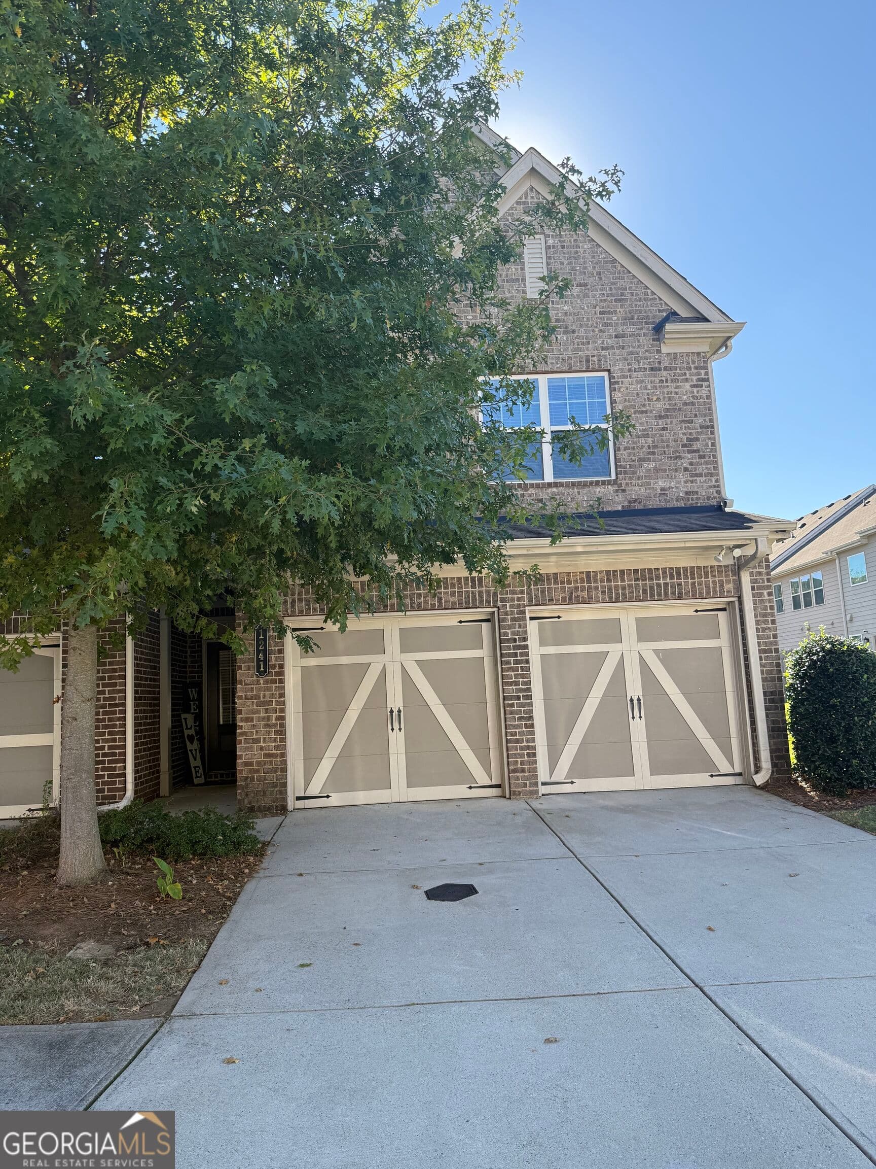 3 bedroom, 2.5 bathroom, 1,842 sq ft townhouse for sale at 1241 Foxcroft Lane, Cumming, GA 30041