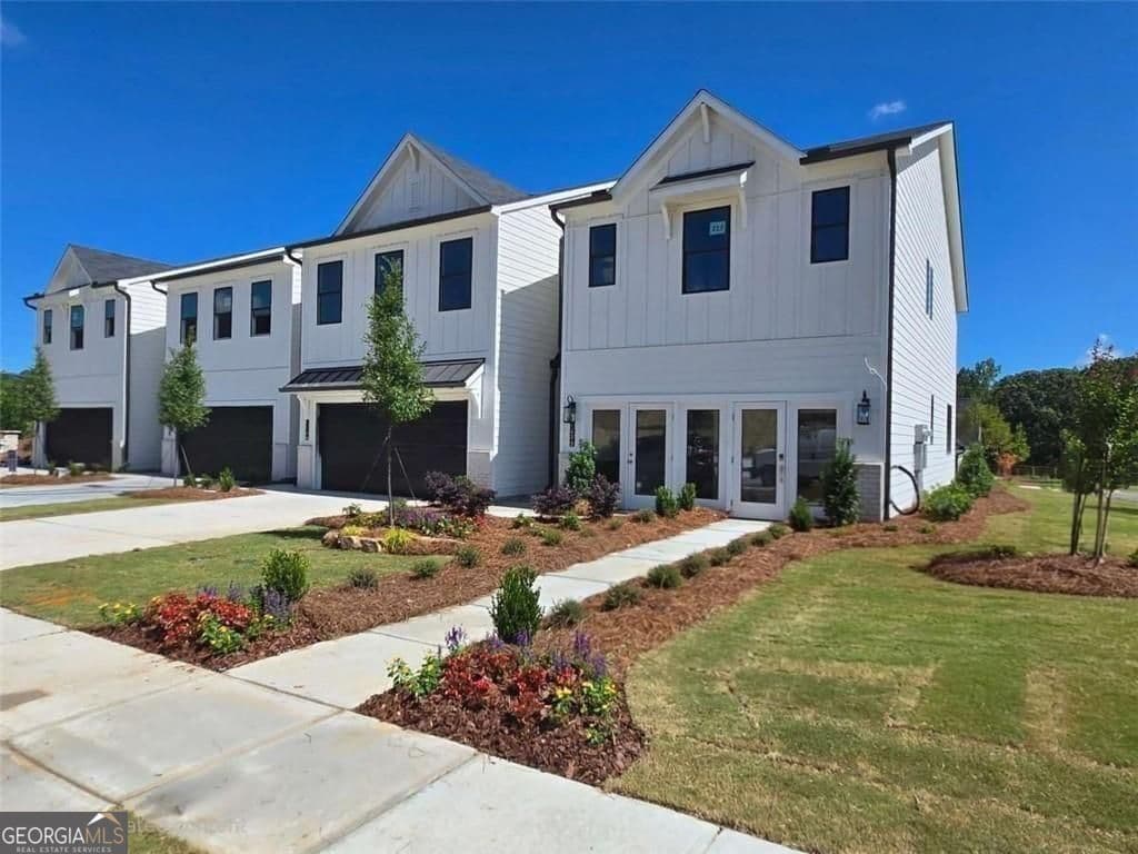 3 bedroom, 2.5 bathroom, 1,855 sq ft townhouse sold at 7433 Quinn Place 141, Flowery Branch, GA 30542