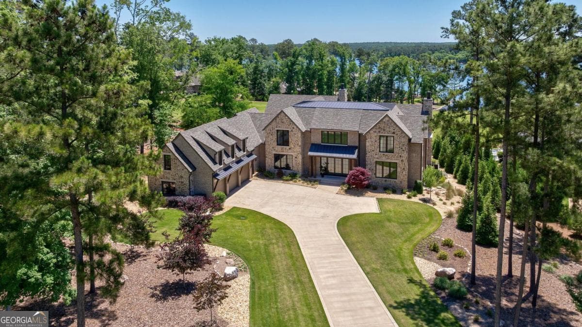 6 bedroom, 6.5 bathroom, 7,977 sq ft single family residence sold at 2880 Linger Longer Drive, Greensboro, GA 30642