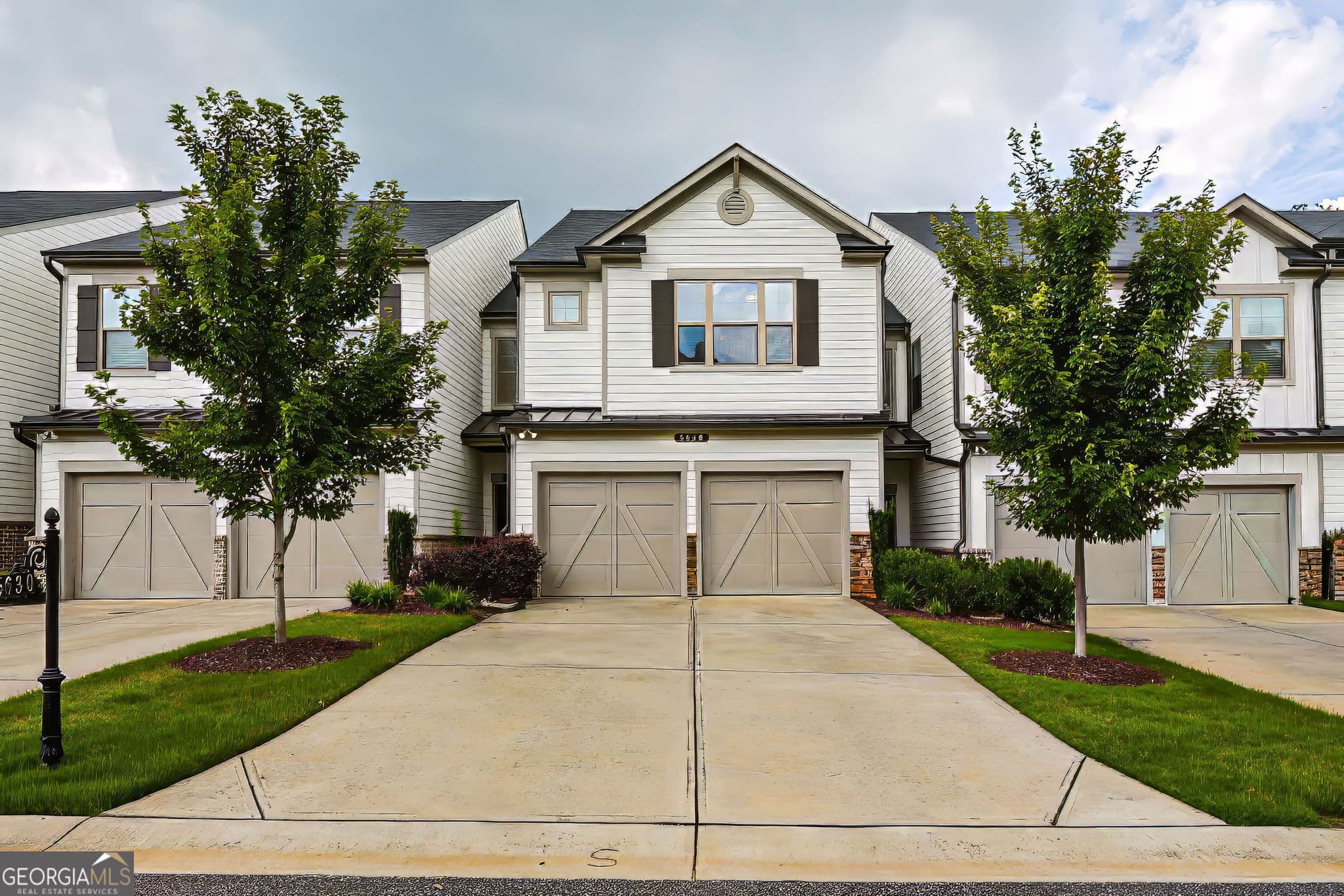 3 bedroom, 2.5 bathroom, 1,832 sq ft townhouse for sale at 5630 Flint Lane, Cumming, GA 30028