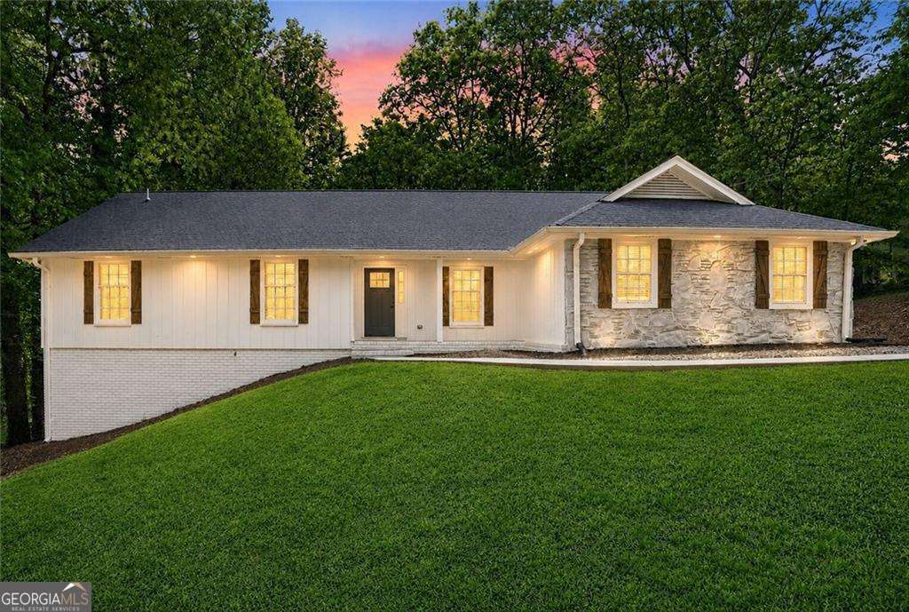 4 bedroom, 3 bathroom, 3,412 sq ft single family residence sold at 610 Pine Grove Road, Roswell, GA 30075