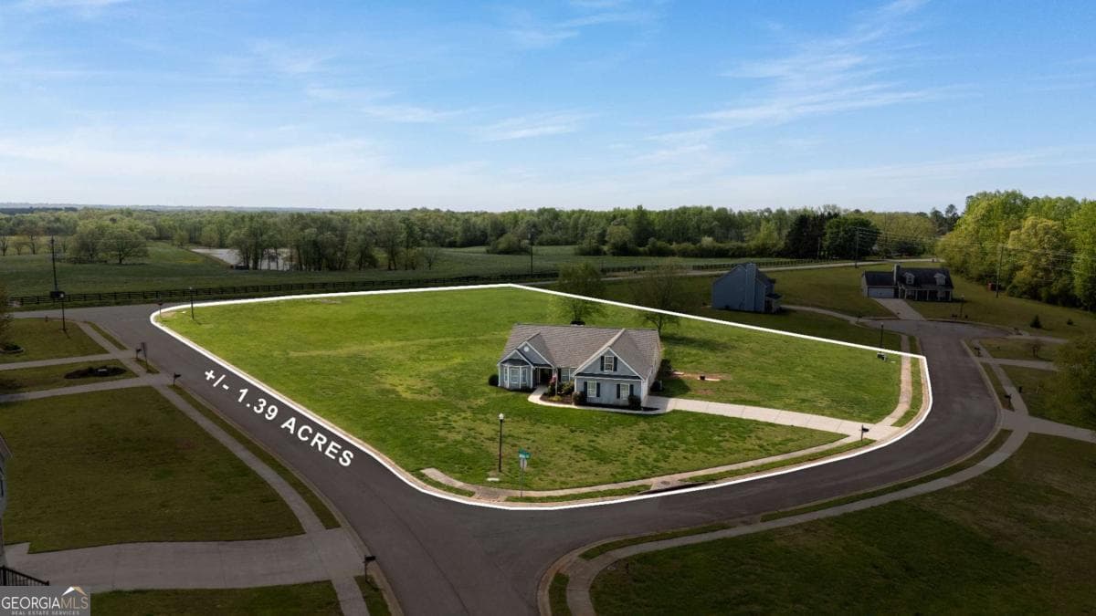 3 bedroom, 2.5 bathroom, 2,326 sq ft single family residence sold at 8311 Mountain Breeze Court, Clermont, GA 30527