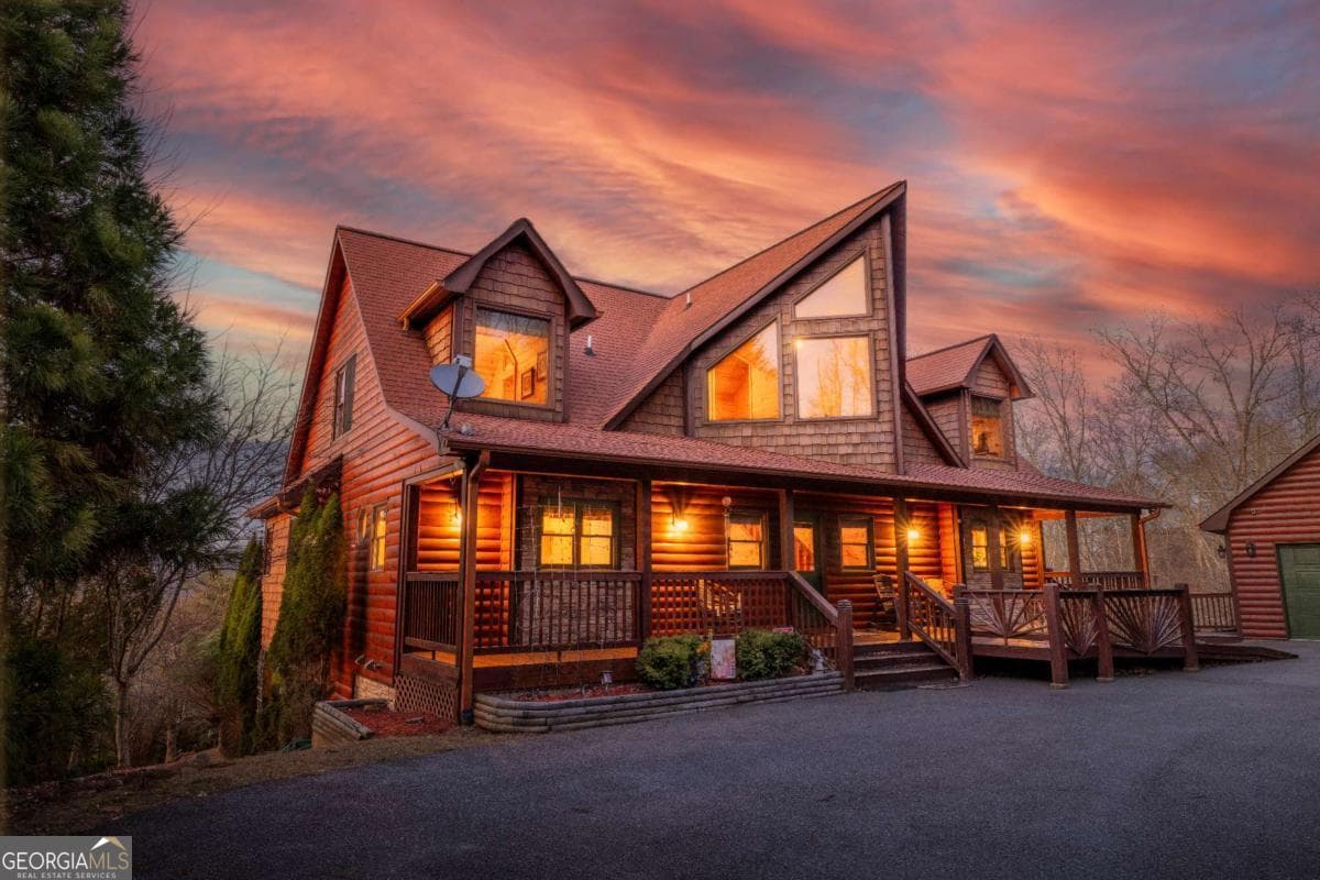 5 bedroom, 3.5 bathroom, 4,120 sq ft cabin,single family residence for sale at 1359 Mountain High Drive, Mineral Bluff, GA 30559