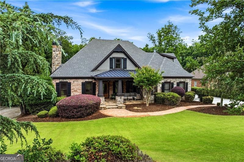 6 bedroom, 5.5 bathroom, 6,566 sq ft single family residence sold at 6855 Bragg Road, Cumming, GA 30041