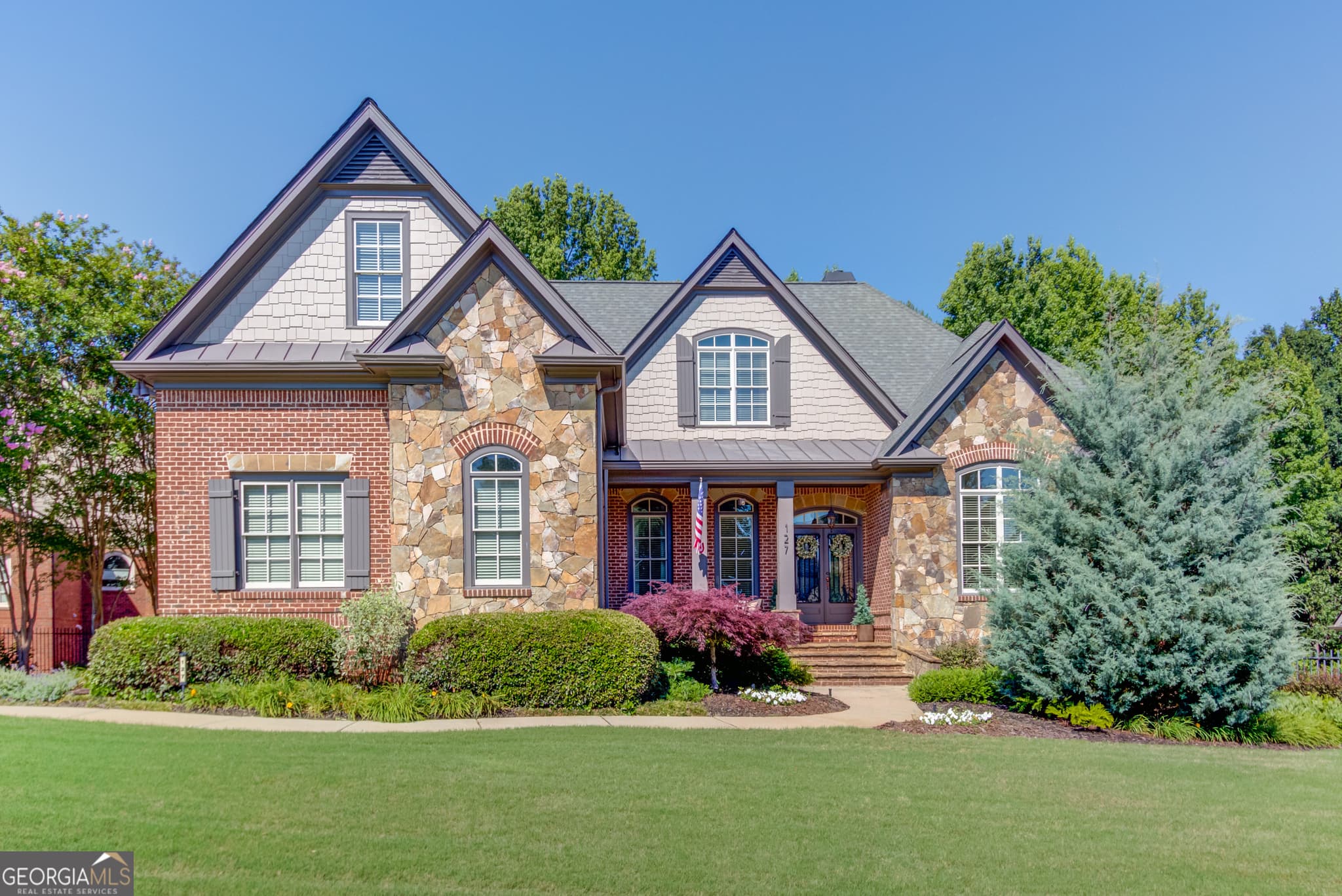 6 bedroom, 7 bathroom, 6,800 sq ft single family residence sold at 127 Slate Drive, Buford, GA 30518