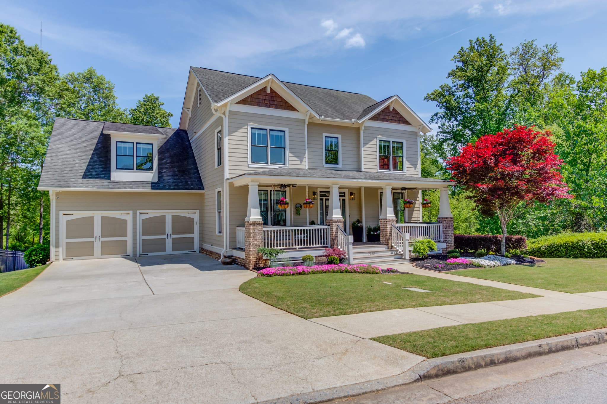 5 bedroom, 4.5 bathroom, 5,080 sq ft single family residence sold at 7133 Grand Reunion Drive, Hoschton, GA 30548