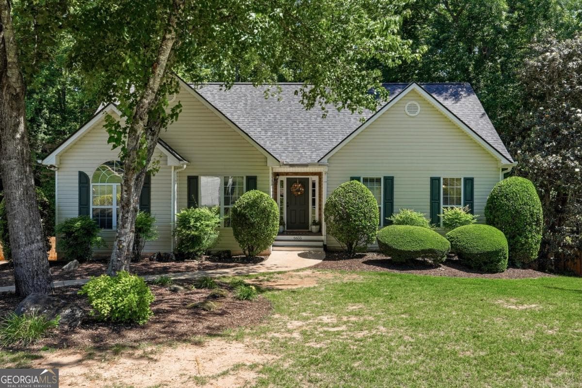 4 bedroom, 3 bathroom, 2,597 sq ft single family residence sold at 6655 N Glen Drive, Cumming, GA 30028