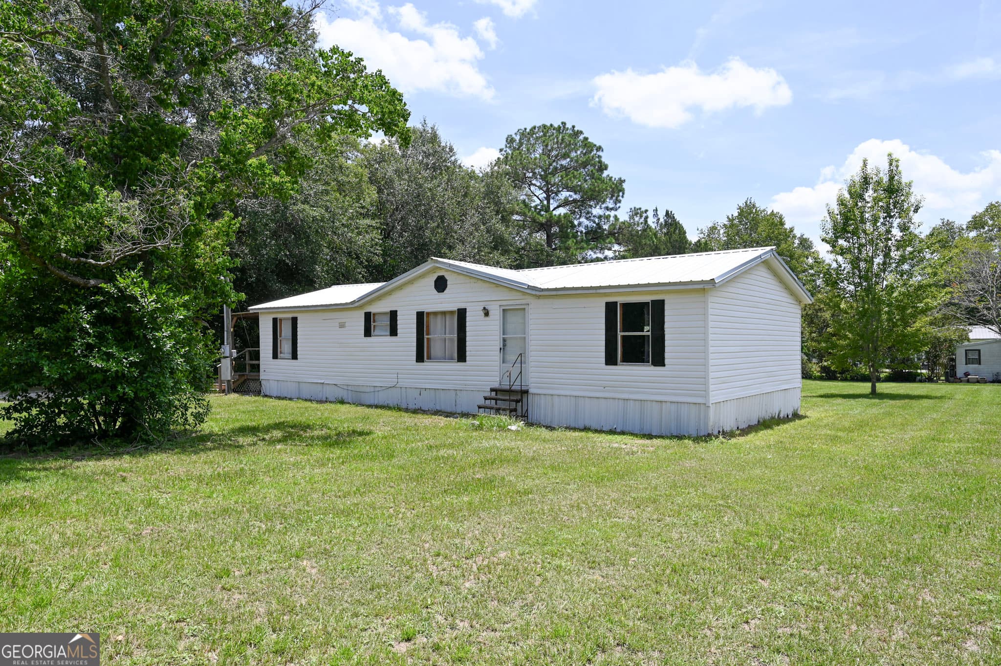 3 bedroom, 2 bathroom, 1,272 sq ft manufactured home,single family residence for sale at 1957 Brogdon Road, Waycross, GA 31503