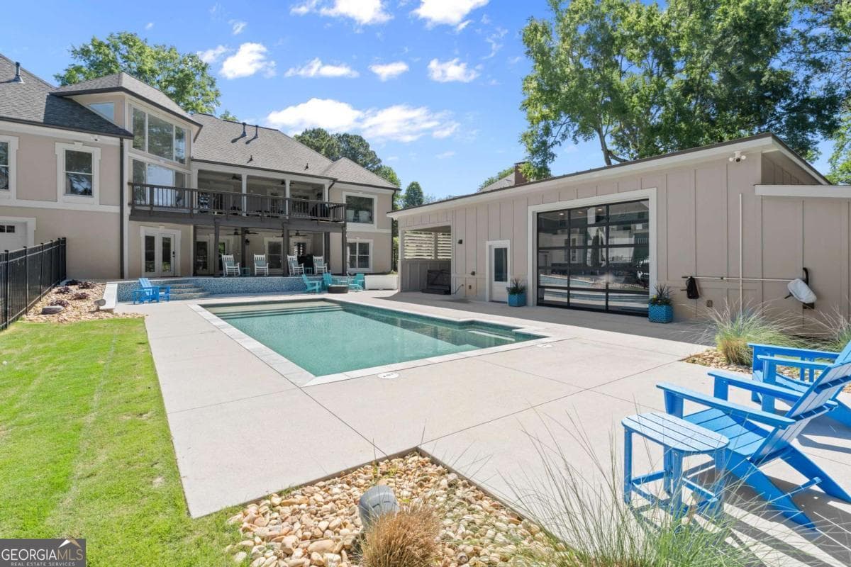 6 bedroom, 5.5 bathroom, 7,401 sq ft single family residence sold at 7040 Polo Drive, Cumming, GA 30040