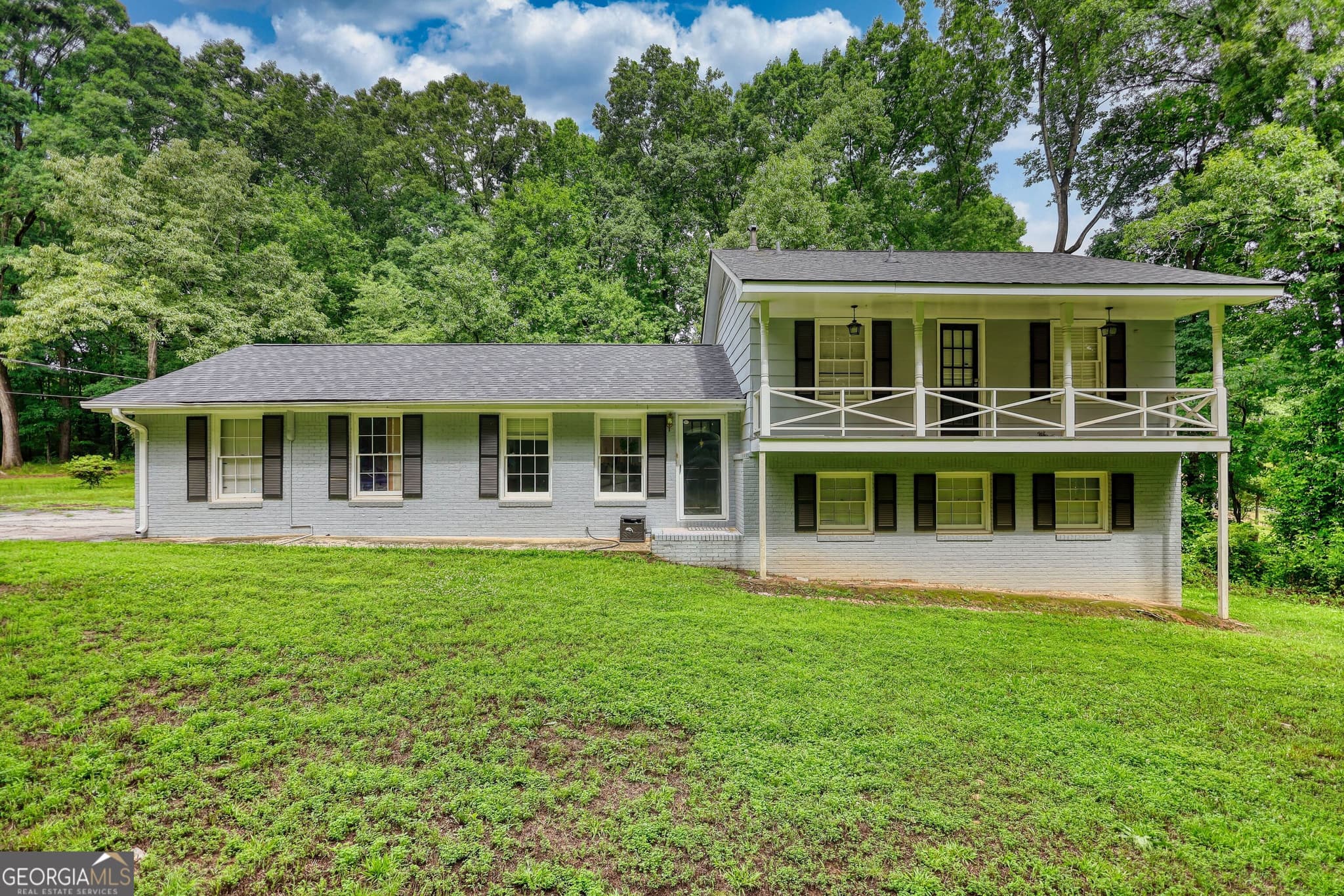 3 bedroom, 3 bathroom, 1,630 sq ft single family residence sold at 2394 Rockbridge Road, Stone Mountain, GA 30087