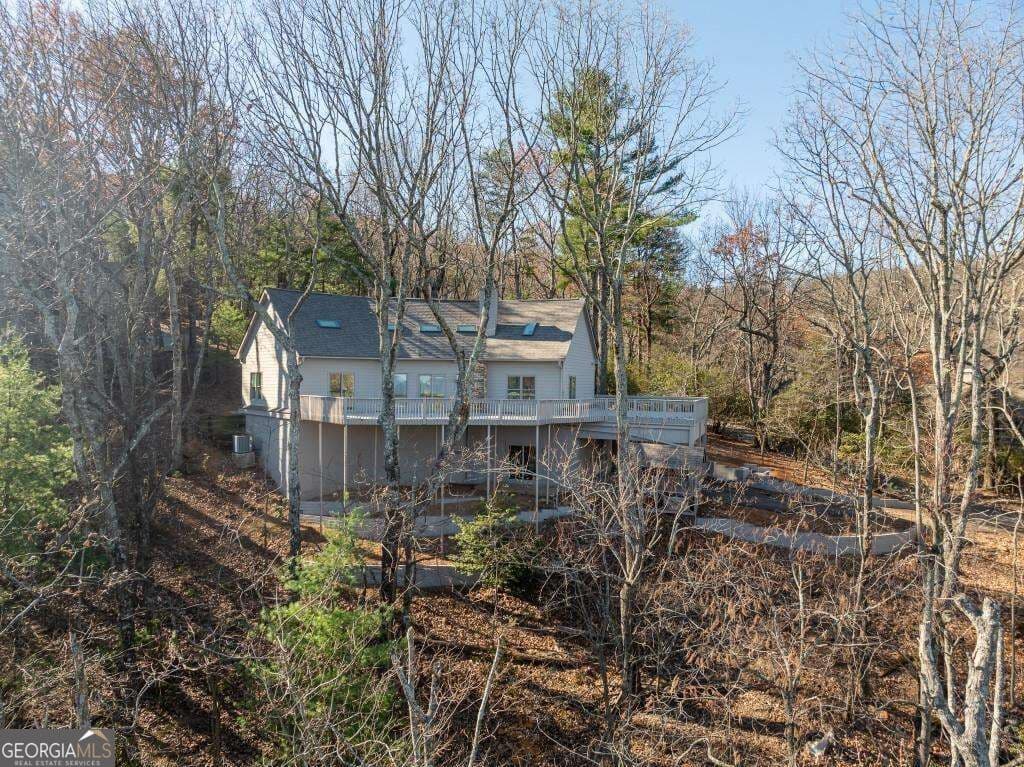 4 bedroom, 4.5 bathroom, 2,353 sq ft single family residence for sale at 62 Bear Cub Ridge, Big Canoe, GA 30143