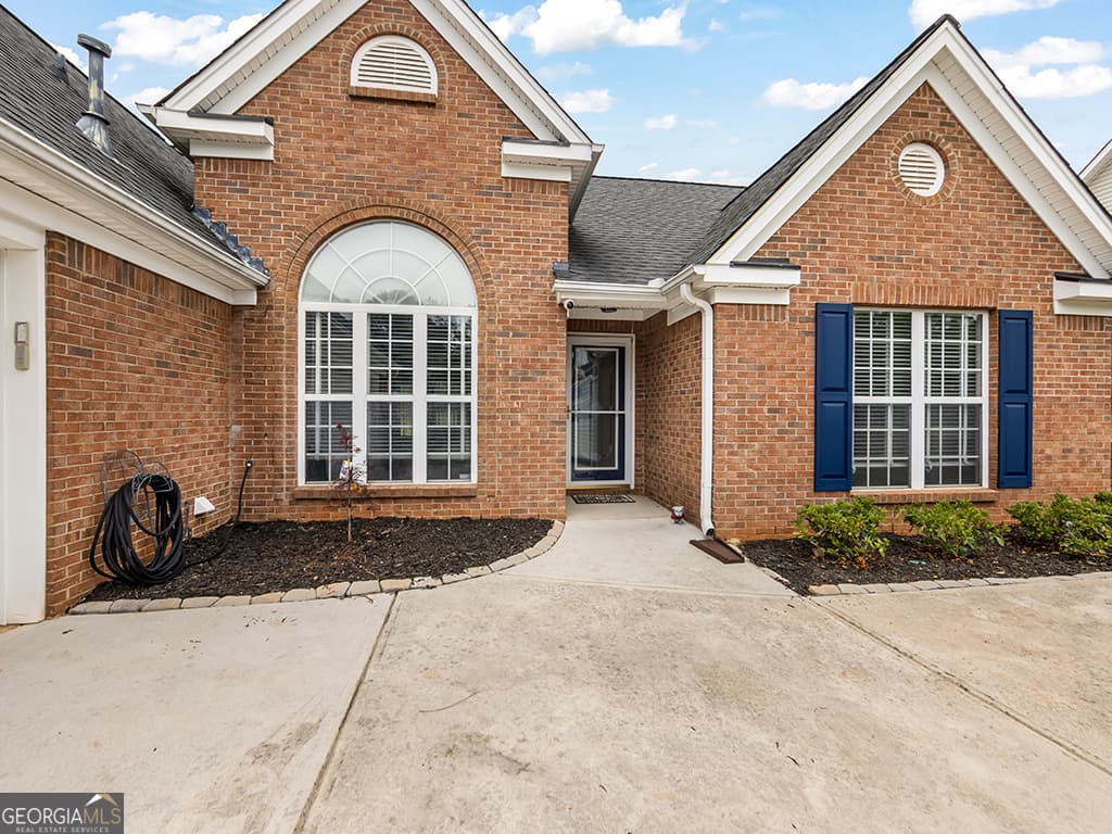 3 bedroom, 2 bathroom, 2,069 sq ft single family residence sold at 7625 Paddocks Mill Drive, Cumming, GA 30041