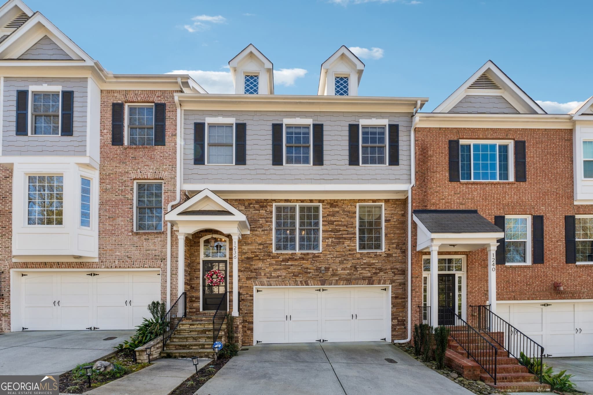 3 bedroom, 3.5 bathroom, 2,457 sq ft townhouse sold at 1236 Brickton Drive, Atlanta, GA 30318
