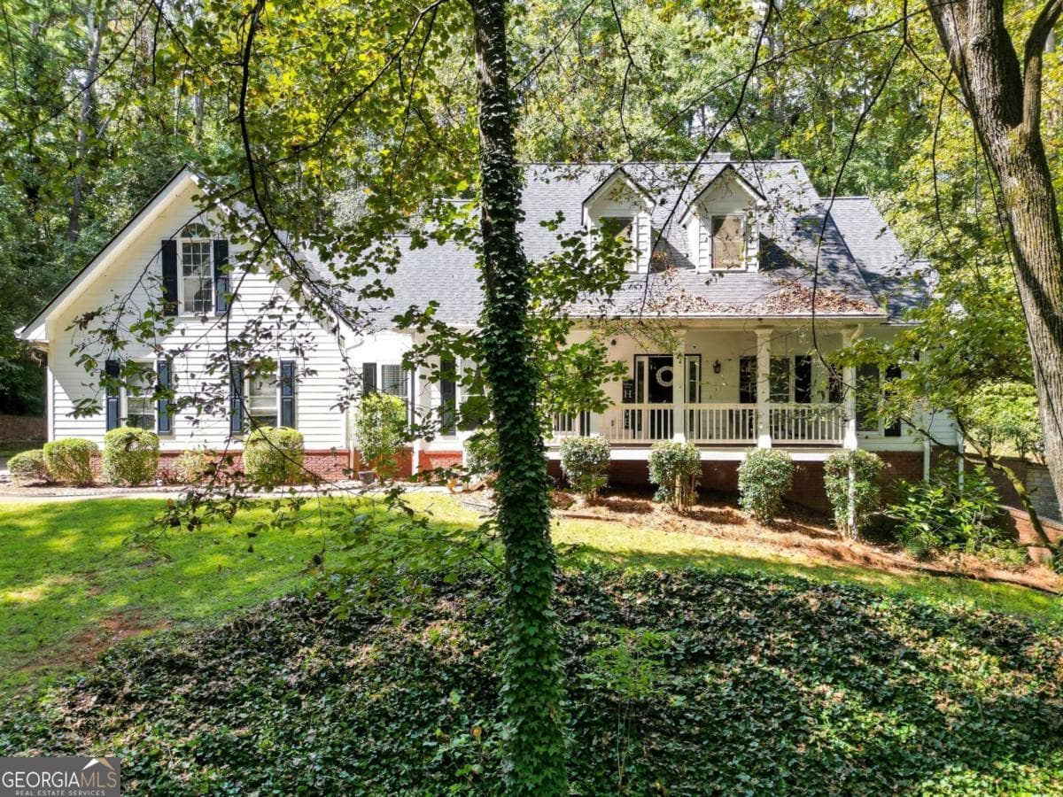 7 bedroom, 3.5 bathroom, 4,400 sq ft single family residence for sale at 5090 Eubanks Road, Woodstock, GA 30188