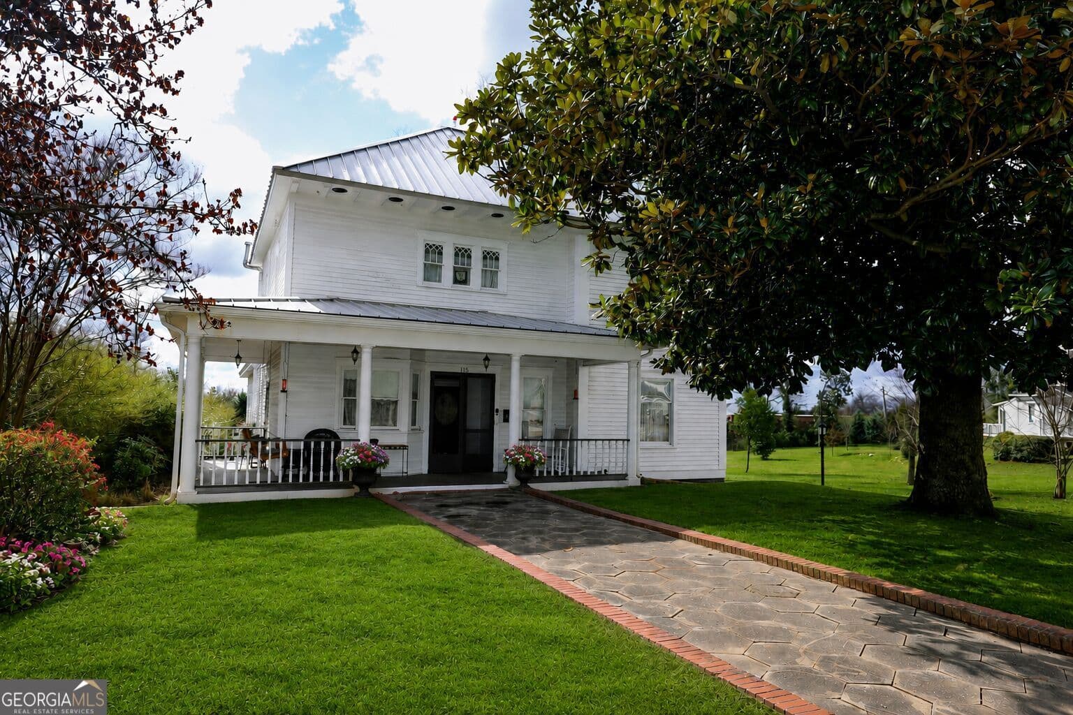4 bedroom, 3 bathroom, 4,144 sq ft single family residence for sale at 115 Greenville Street, Newnan, GA 30263