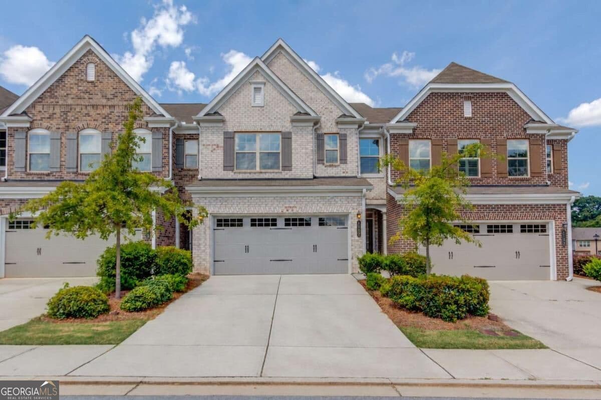 3 bedroom, 2.5 bathroom, 1,886 sq ft townhouse for sale at 1182 Lanier Willow Path, Buford, GA 30518