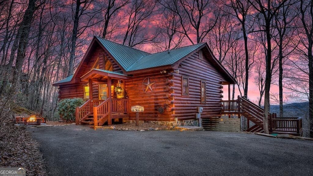 2 bedroom, 2 bathroom, 864 sq ft cabin,single family residence sold at 203 Chimney Rock Road 467, Cherry Log, GA 30522
