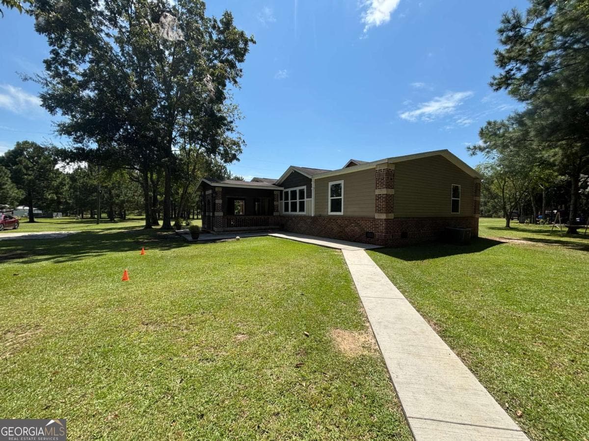 3 bedroom, 2 bathroom, 1,568 sq ft manufactured home,single family residence sold at 694 Overstreet Road, Jesup, GA 31546