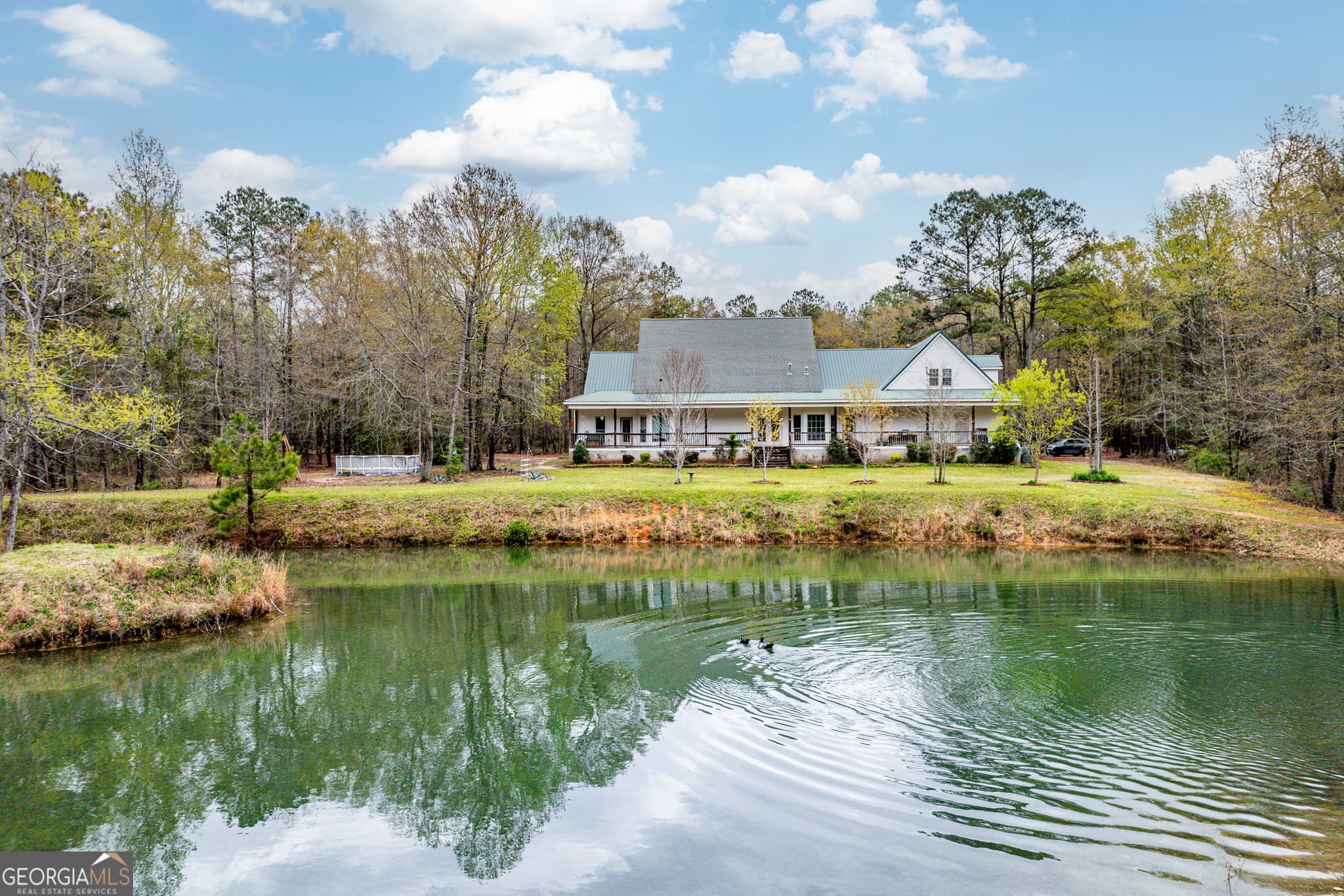 4 bedroom, 3.5 bathroom, 3,701 sq ft single family residence sold at 1510 Holloway-Ray Road, Mcintyre, GA 31054