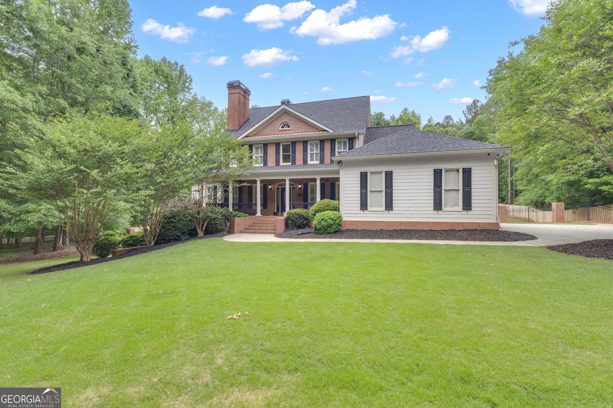 5 bedroom, 5 bathroom, 4,988 sq ft single family residence sold at 295 Postwood Drive, Fayetteville, GA 30215