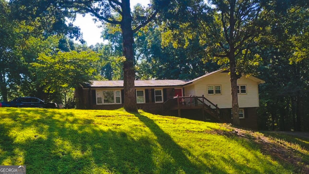 4 bedroom, 3 bathroom, 1,476 sq ft single family residence for sale at 132 Little Brook Drive, Woodstock, GA 30188