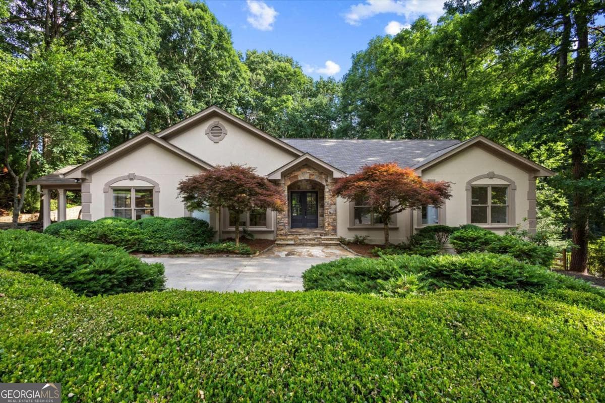 3 bedroom, 3 bathroom, 5,952 sq ft single family residence sold at 8920 Huntcliff Trace, Atlanta, GA 30350