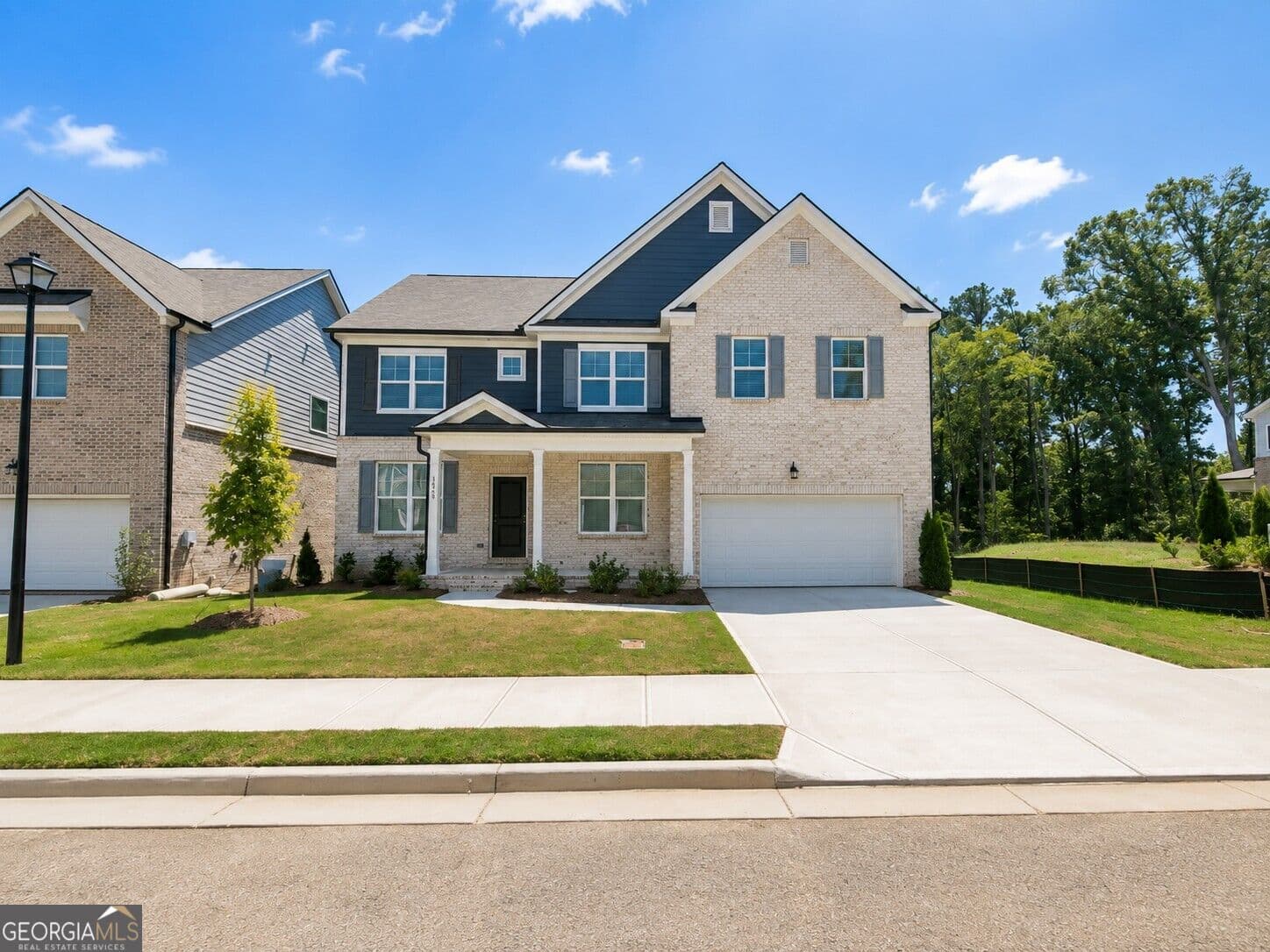 5 bedroom, 4 bathroom, 3,167 sq ft single family residence for sale at 1059 Georgian Point Drive LOT 85, Lawrenceville, GA 30045