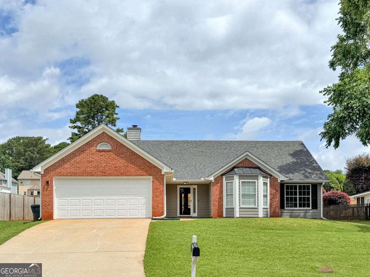 3 bedroom, 2 bathroom, 1,663 sq ft single family residence for sale at 1435 Wheatfield Drive, Lawrenceville, GA 30043