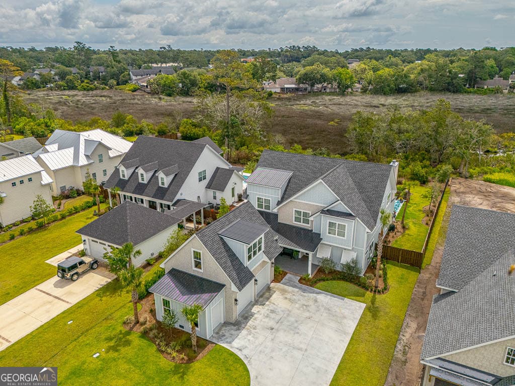 6 bedroom, 5.5 bathroom, 4,350 sq ft single family residence for sale at 28 Orchard Road, St. Simons, GA 31522