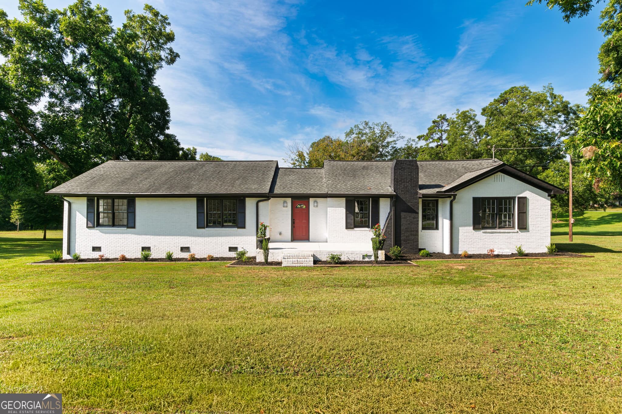 4 bedroom, 3 bathroom, 2,202 sq ft single family residence for sale at 418 Lamb Road, Moreland, GA 30259