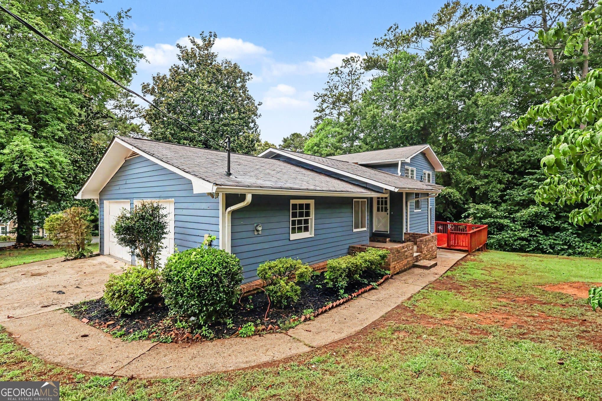 5 bedroom, 3 bathroom, 2,393 sq ft single family residence for sale at 3348 Goldenchain Drive, Lithonia, GA 30038