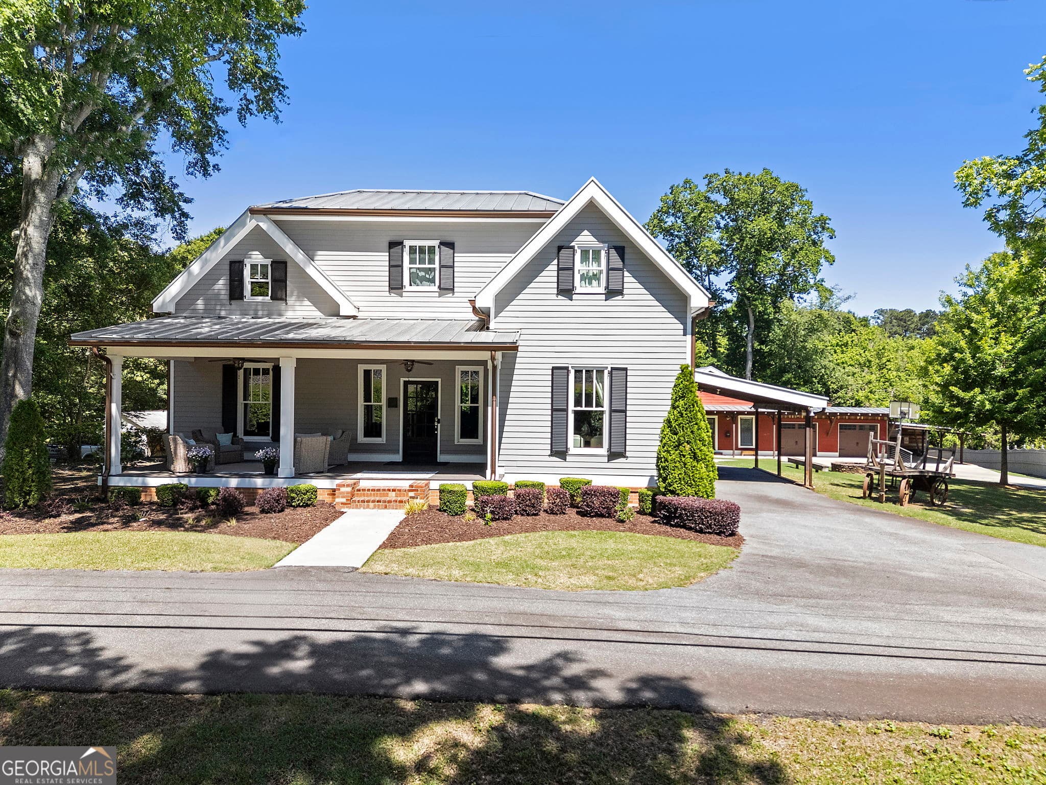 7 bedroom, 6.5 bathroom, 6,388 sq ft single family residence sold at 527 Main Street, Suwanee, GA 30024