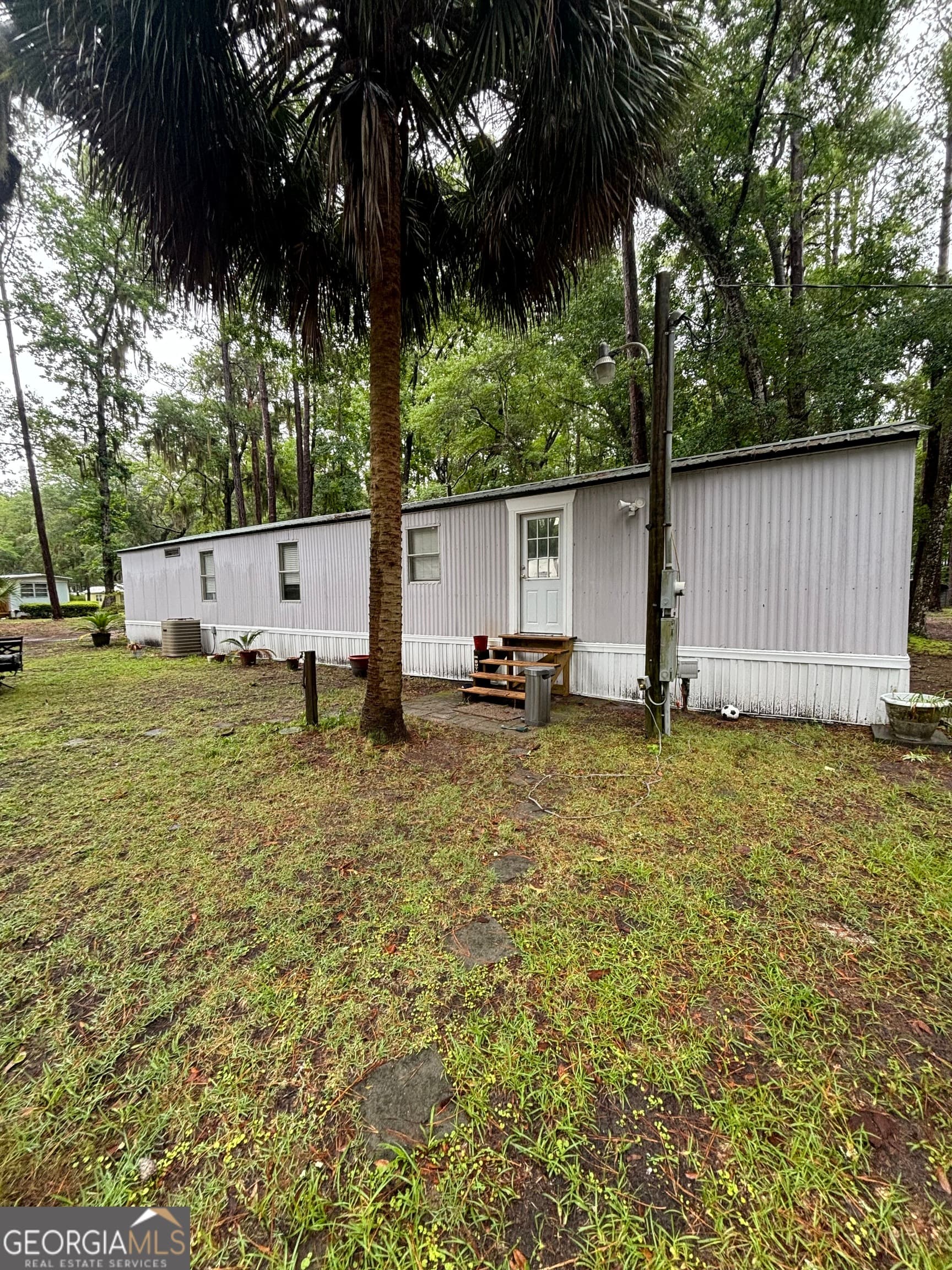 3 bedroom, 2 bathroom, 864 sq ft manufactured home,single family residence for sale at 1081 Caton Road, Townsend, GA 31331