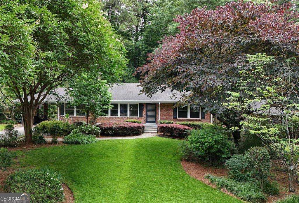 4 bedroom, 3.5 bathroom, 4,164 sq ft single family residence sold at 1437 N Amanda Circle, Atlanta, GA 30329