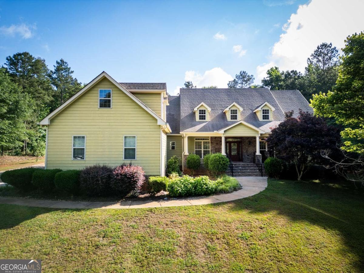 6 bedroom, 3.5 bathroom, 5,166 sq ft single family residence for sale at 283 Creekside Drive, Arnoldsville, GA 30619