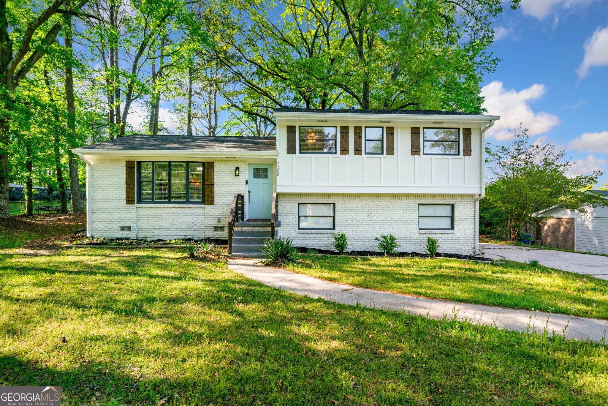 3 bedroom, 3 bathroom, 1,228 sq ft single family residence sold at 3180 Spring Street, South Fulton, GA 30349