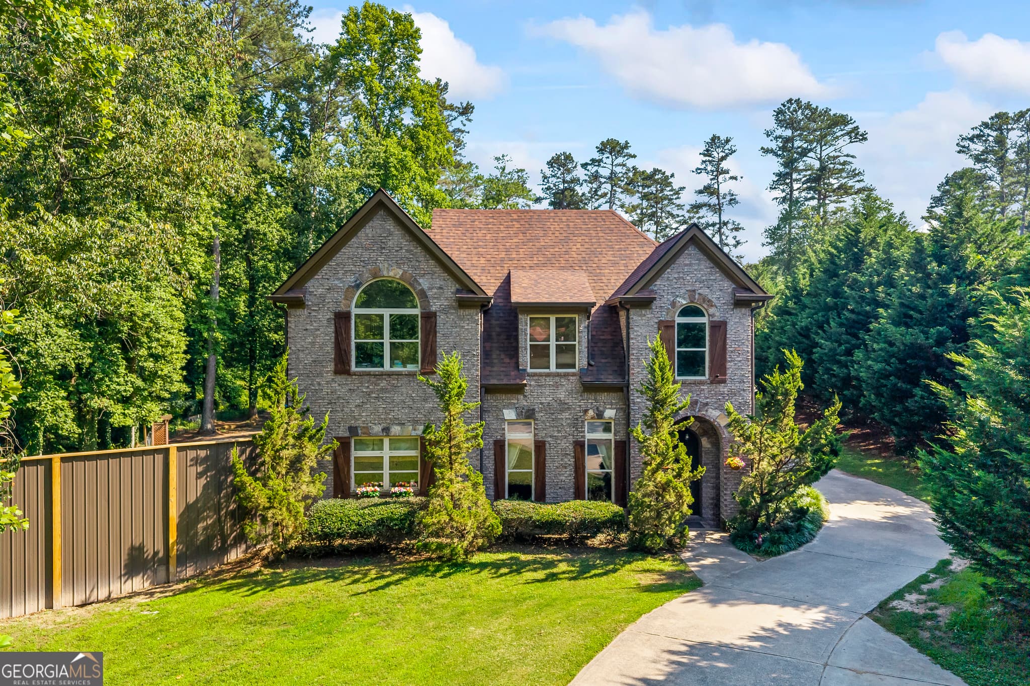 7 bedroom, 6.5 bathroom, 3,171 sq ft single family residence for sale at 9315 Meadowbrook Drive, Gainesville, GA 30506