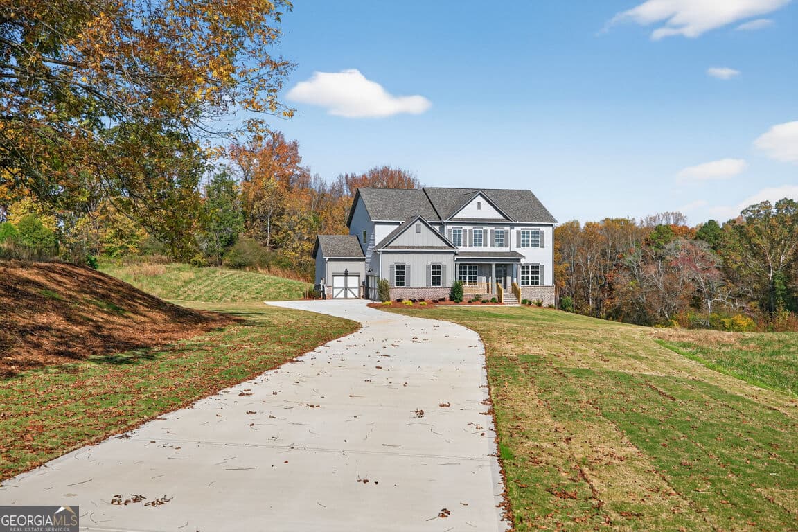 5 bedroom, 4.5 bathroom, 3,213 sq ft single family residence for sale at 8845 jot em down Road, Gainesville, GA 30506