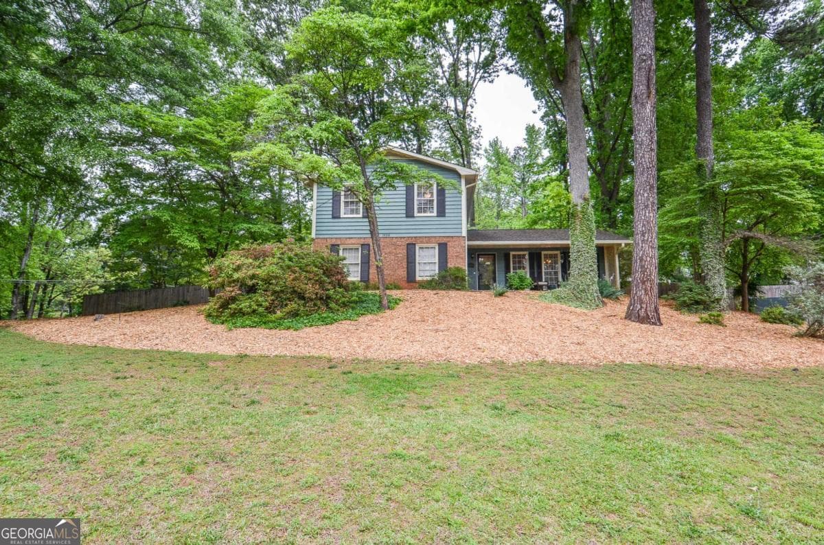 3 bedroom, 2 bathroom, 2,046 sq ft single family residence sold at 1438 Ridgeland Court, Lilburn, GA 30047
