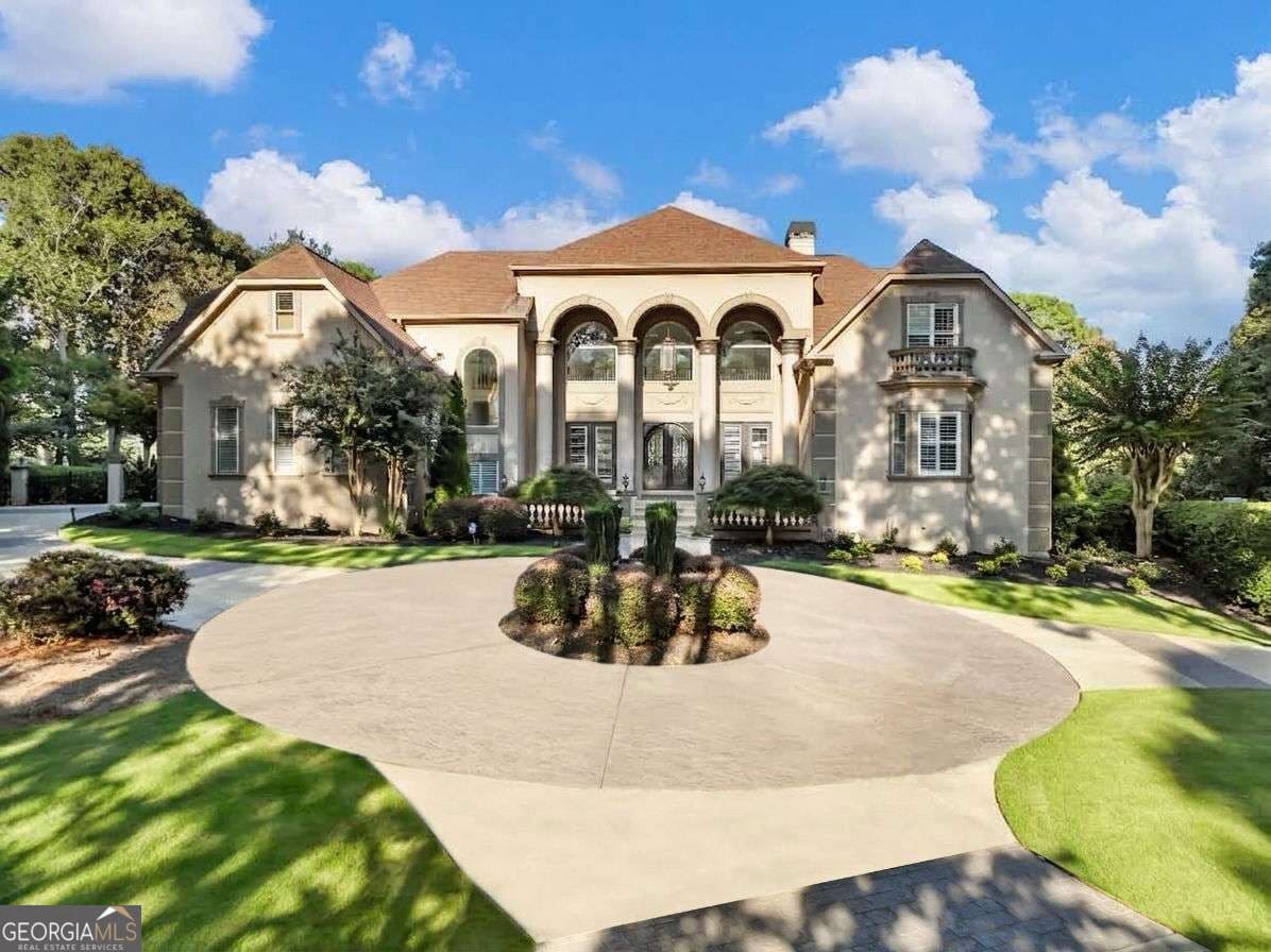 5 bedroom, 5.5 bathroom, 8,805 sq ft single family residence for sale at 1905 Kathy Whitworth Drive, Braselton, GA 30517