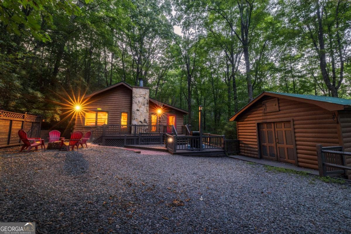 3 bedroom, 2 bathroom, 1,696 sq ft cabin,single family residence sold at 556 Cherry Lake Drive, Cherry Log, GA 30522