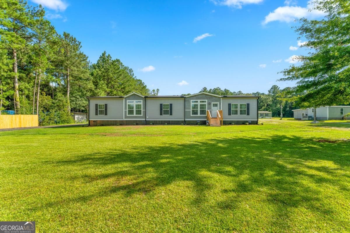 4 bedroom, 2 bathroom, 2,254 sq ft manufactured home,single family residence for sale at 302 Middleton Road, Guyton, GA 31312