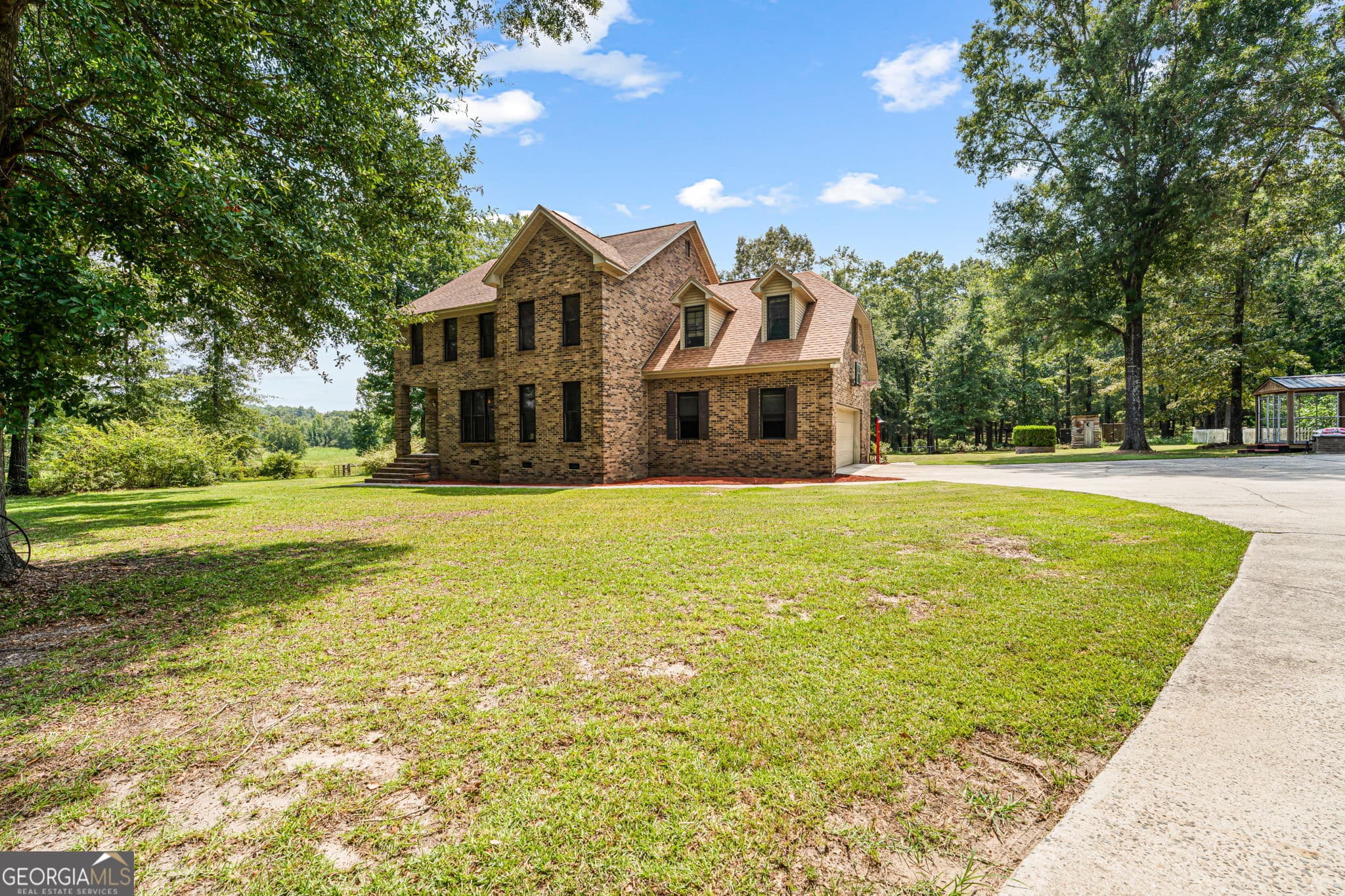 4 bedroom, 3 bathroom, 2,668 sq ft single family residence for sale at 1010 Frank Cook Road, Cochran, GA 31014